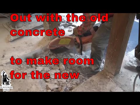 Tearing out the old concrete to make room for the new power hammer foundation