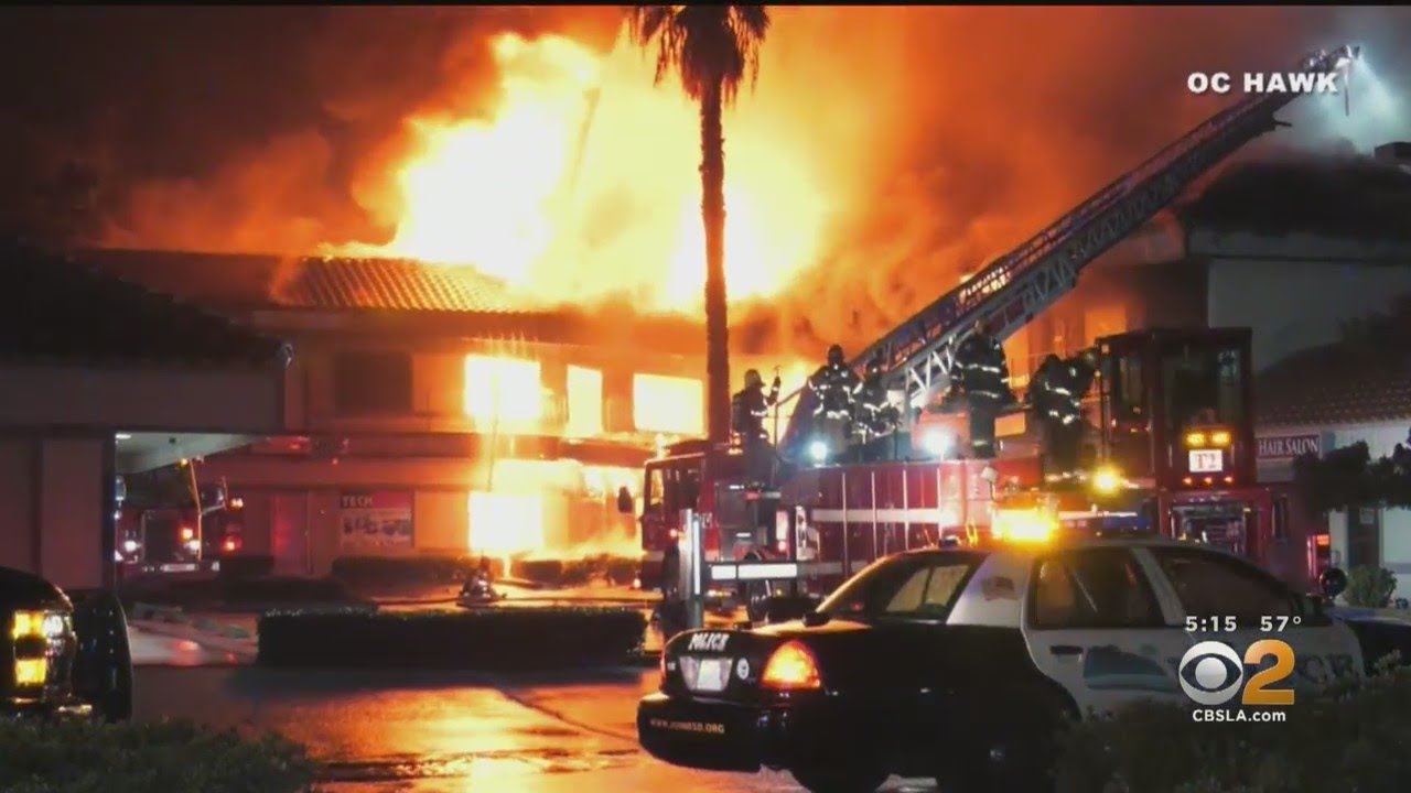 Strip Mall Fire Causes Major Damage, Mostly Sparing Church - YouTube