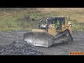 4K| CAT D8T Pushing Out Truck Loads