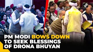 PM Modi touches feet of Padma Shri Awardee Drona Bhuyan