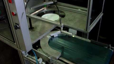 Automatic stacker for plastic lids 2