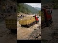 Sand Trucks Passing Through Rural Villages