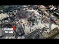 South africa building collapse kills at least 7 as rescuers uncover survivors from rubble