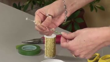 Triangle Nursery - Preparing beads for use in flower arrangements