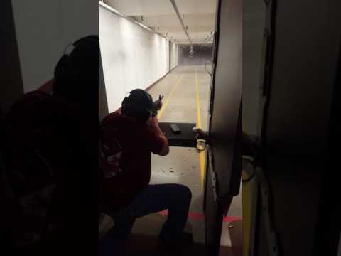 Shooting an Ar15 at the range.