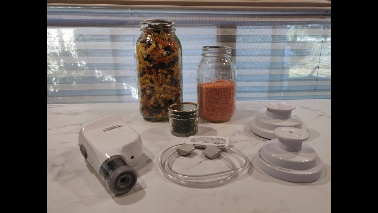 Vacuum Sealing Dry Goods in Mason Jars with a Handheld Vacuum Sealer