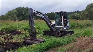 Terex TC 60 z łyżką trapezową wykop rowu melioracyjnego