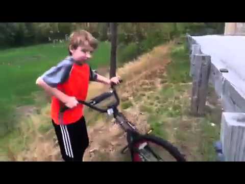 Kid riding his bike down a very steep hill - HqDefault