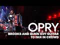 Brooks & Dunn Gift Guitar To Fan In Crowd!