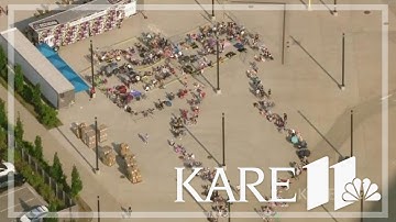Taylor Swift fans line up for tour merch outside US Bank Stadium