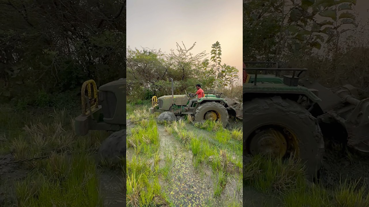 John Deere tractor stuck in mud 