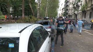 Bad weather in Milan, fallen trees and damaged cars