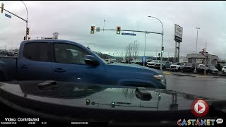 Runs red light, near crash