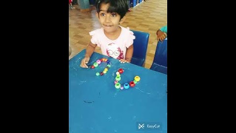Activity : # Arranged beads on an upward curve  downward curve by NURSERY kids