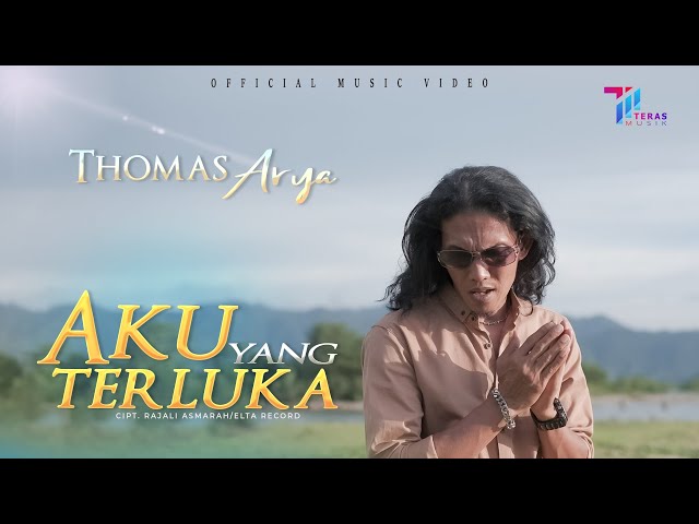 Thomas Arya - Aku Yang Terluka ( Official Music Video ) class=