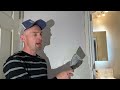 Easy drywall repair basic guide to  applying a layer of mud 