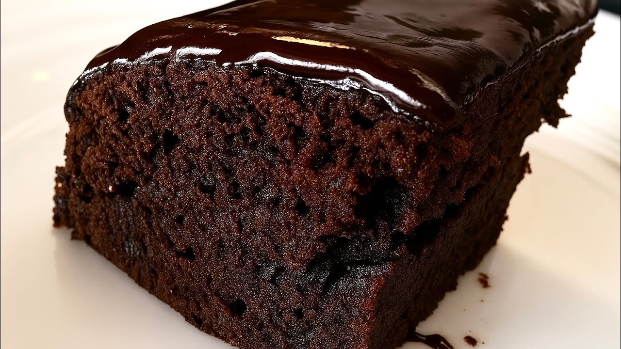 Rich dark Chocolate Cake from scratch! Creamy chocolate Ganache!