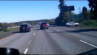 I205N 4-18-2024 Reckless White Honda/Toyota WA plates spins out, loses control passing on shoulder