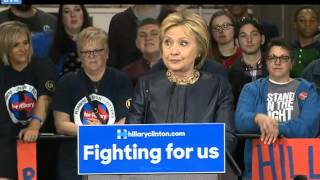 Hillary Clinton needs water to stop coughing uncontrollably during event
