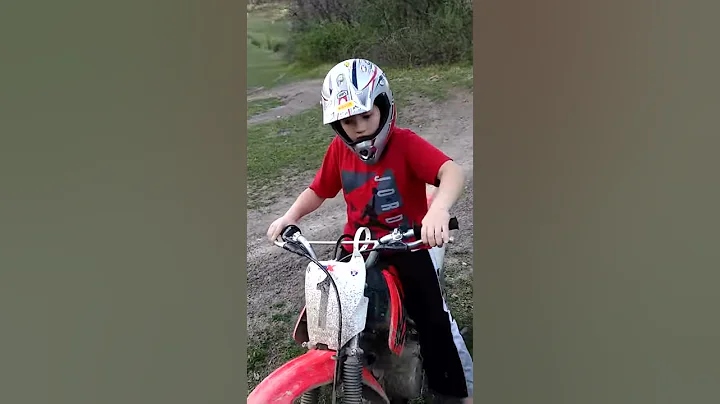 My grand kid on his new dirt bike