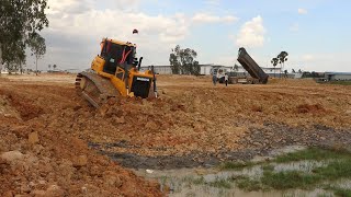 Incredible land fill up mighty machinery Bulldozer SHANTUI pushing soil and truck unloading soil