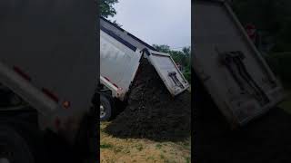 Top soil delivery to grade and plant new grass