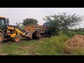 Ashok Leyland tipper lorry heavy load stuck in the mud and jcb 3DX  backhoe operator push the lorry