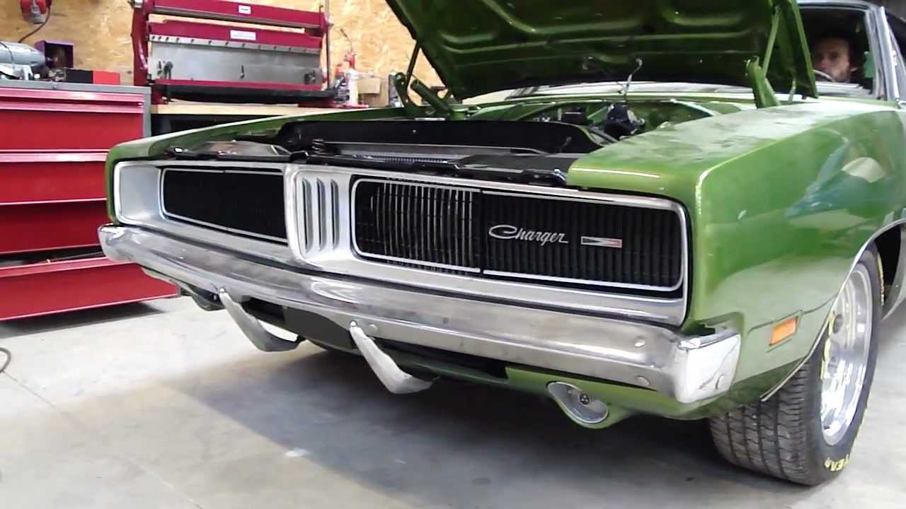 dodge charger 1969 383 headlight door - YouTube