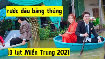 chú rể chèo thúng điêu luyện rước cô dâu vượt lũ dữ Miền Trung về làm lễ thành hôn