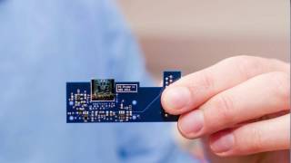 Engineers Shrink Microscope to Dime-sized Device.  MEMS-based Atomic Force Microscope (AFM) on Chip