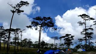 Time Lapse of White fluffy clouds in the blue sky background