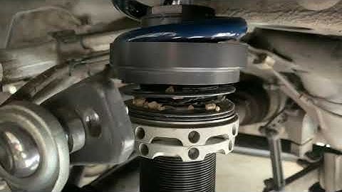 Helper spring bound creating a ride height issue