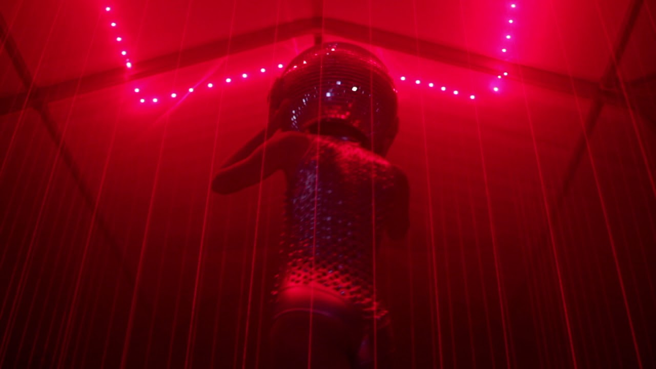 Mezmerising: Disco Podium Dancer with Mirrors in Circle of Light