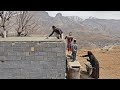 Pouring cement on the roof of Susan's dream house in a rain