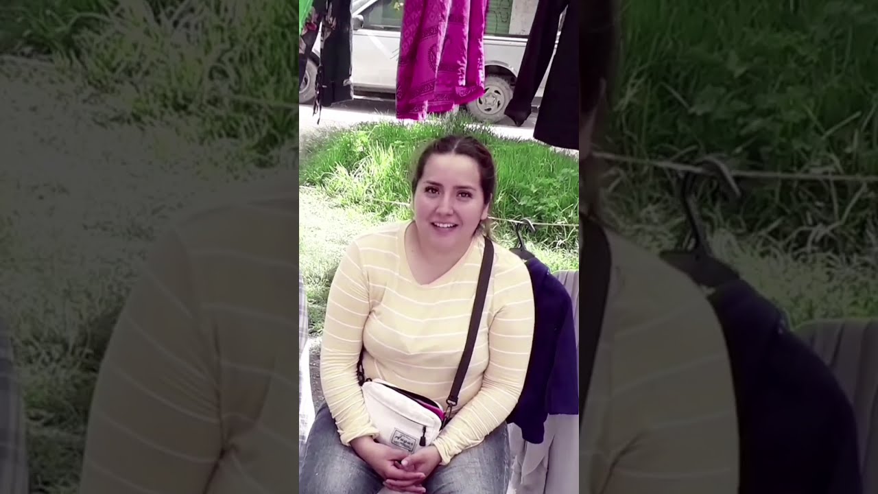 (Reaction) Woman bites her lips frequently when talking to a person.