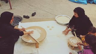 The cooking of Thiri local bread by Bahar Khanum Wazen, her brother