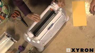 Creating a Fabric Album with the Xyron Creatopia Instructional Video