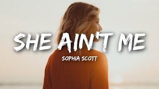 Vignette de la vidéo "Sophia Scott - She Ain't Me (Lyrics)"