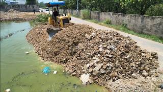 Project SkillfulBulldozer filling Flooded land Land Filling Process Using Dump Trucks