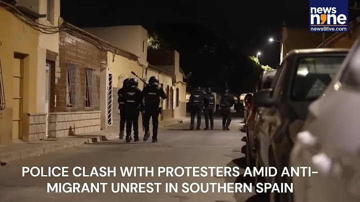 Spain Protest LIVE | Police clash with protesters amid anti-migrant unrest in Spain | News9