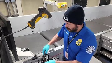 What happens to your suitcase after check-in at the airport?