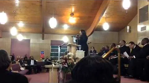 Lady Davena Johnson singing at district. mtg.