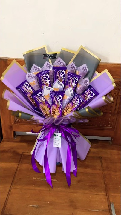 Buket coklat deka ungu series mix uang 10k 10lembar 💜 #buketuang #buketcoklat #buketsnackmurah