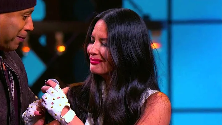 LL COOL J hits Olivia Munn in the face with a Microphone