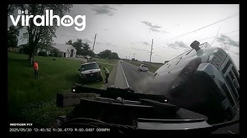 Van Flips On Rollback Tow Truck || ViralHog