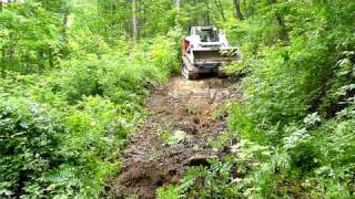 Takeuchi TL 240 Working On Muddy Road