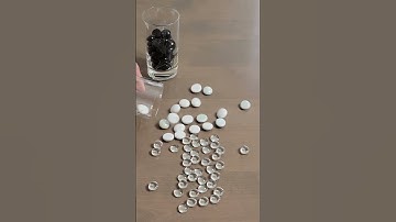 Black, white, and clear glass gems (reverse video, 2x speed)