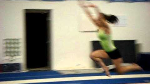 Lexy Foss fronthandspring 1 1/2 back layout stepout