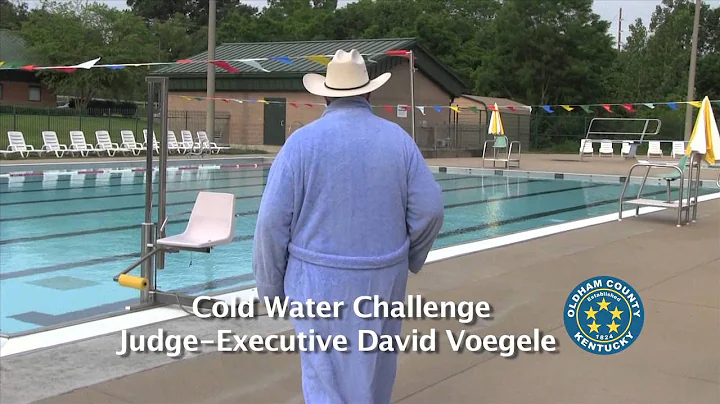 David Voegele accepts  Officer Phil Feigel's  Cold...