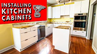 How to INSTALL KITCHEN CABINETS (and remove them)! // DIY Kitchen Remodel Pt. 1